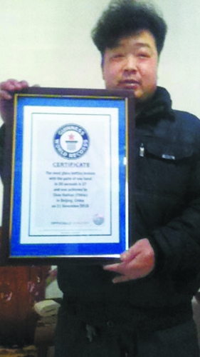 Butcher sets Guinness World Record by shattering glass bottles bare-handed