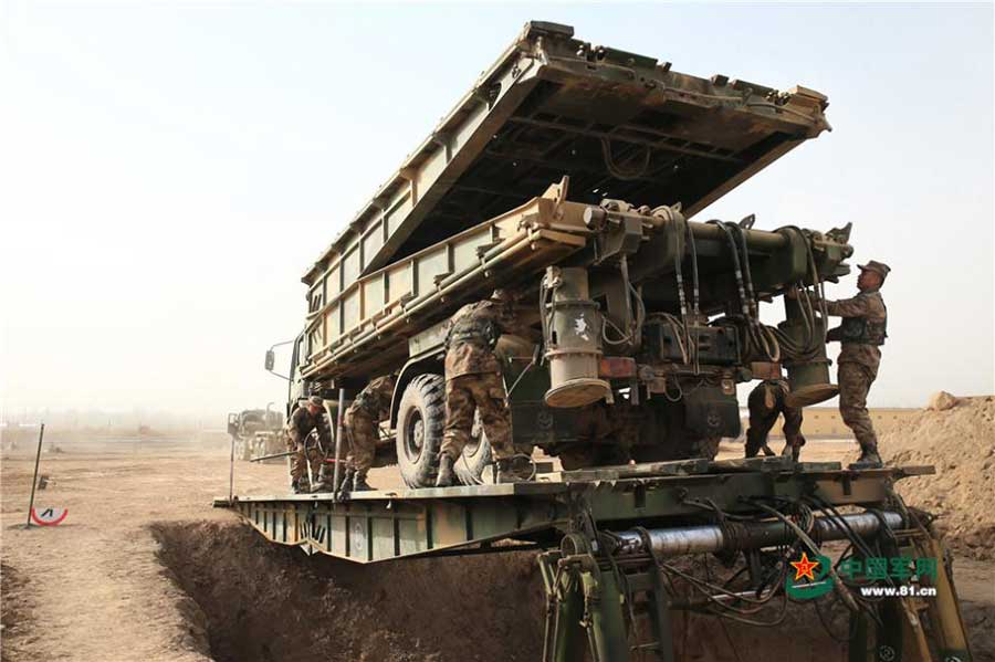 Engineer troop builds bridge in real combat conditions