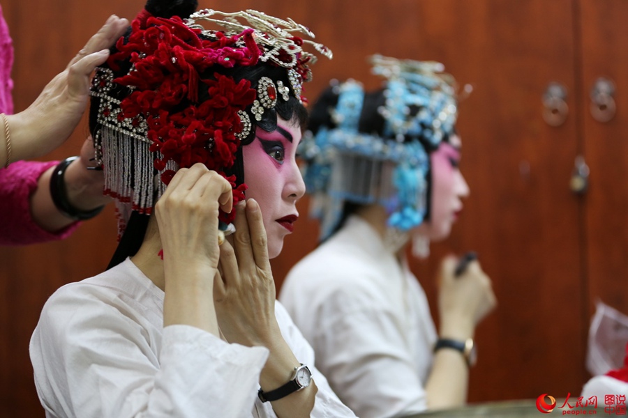 The backstage of a traditional Chinese opera troupe