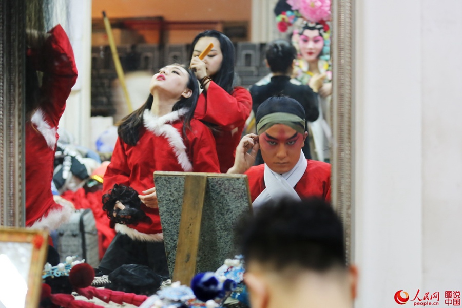 The backstage of a traditional Chinese opera troupe