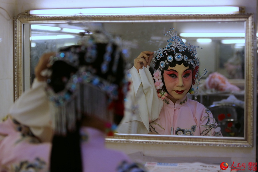 The backstage of a traditional Chinese opera troupe