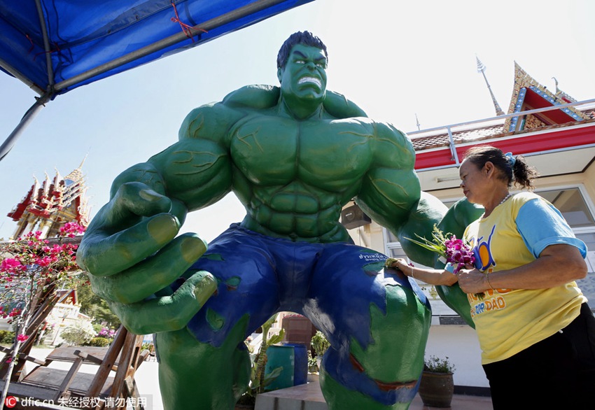 Buddhist temple sets up superhero figures to attract young visitors