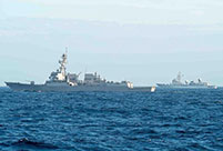Chinese ships keep close watch on U.S. Navy aircraft carrier strike group in S. China Sea
