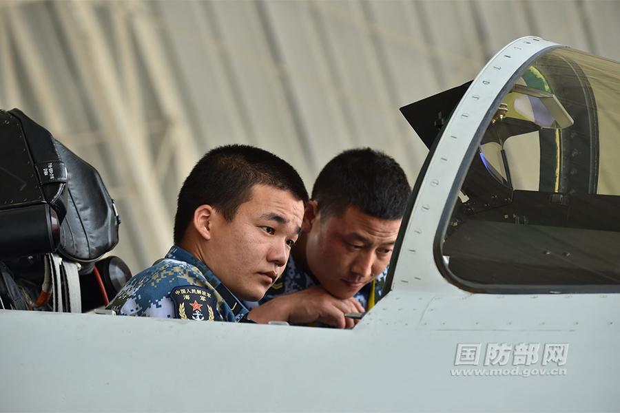 Chinese J-11 fighters conduct training in South China Sea