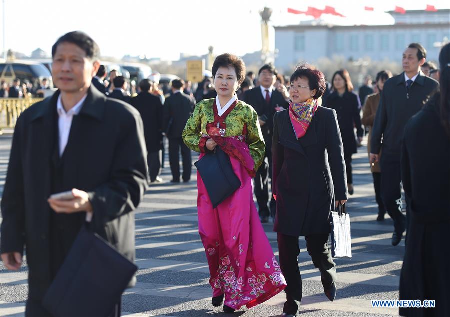 Deputies arrive for 3rd plenary meeting of 4th session of 12th NPC