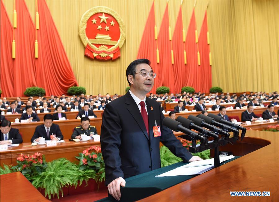 China's judicial system pledges firm hand against threats of state security