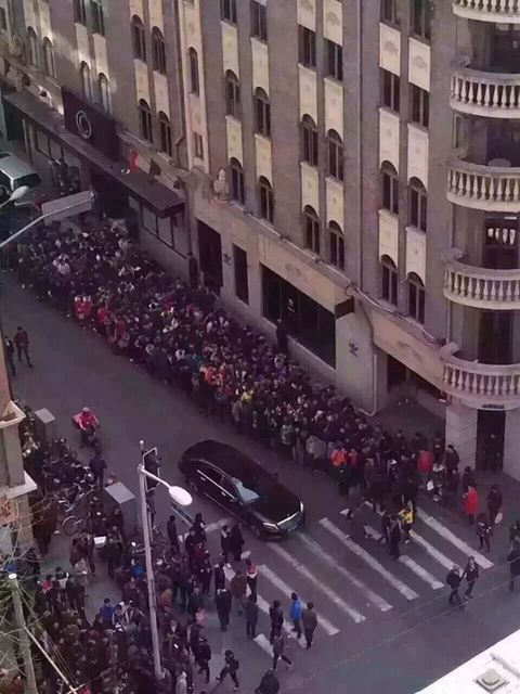 People queue up overnight for a pair of shoes