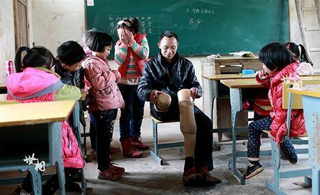 Disabled teacher works in remote village for 30 years 