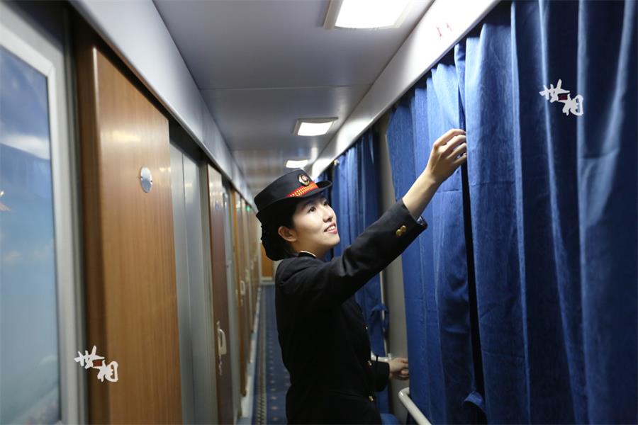 Moments in the life of a beautiful train stewardess