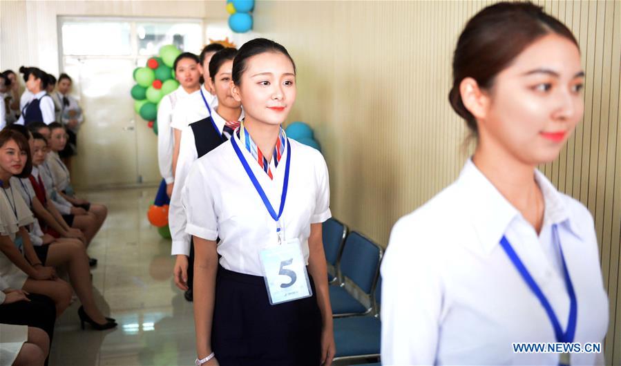 Applicants attend airline stewardess audition in Harbin, NE China