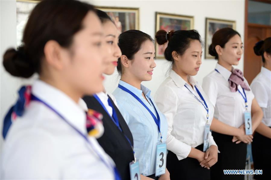 Applicants attend airline stewardess audition in Harbin, NE China