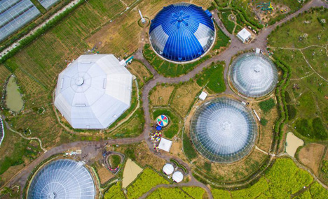 "outer space" theme dome greenhouses attract visitors