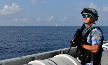 Chinese frigate escorts merchant ships in Gulf of Aden
