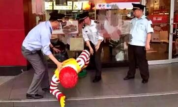 Ronald McDonald 'arrested' by Guangzhou chengguan officers