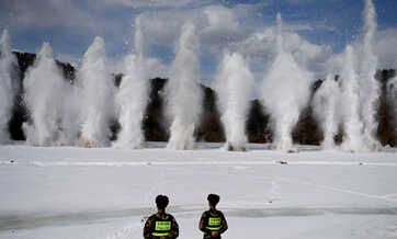 Ice blasting on China-Russia border river