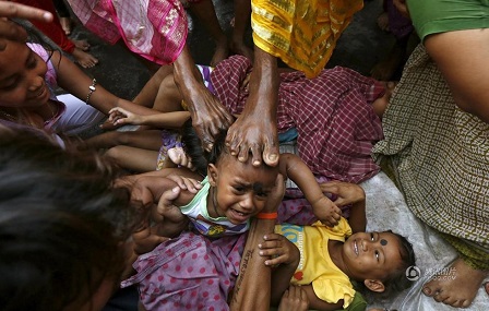 Hindus in West Bengal Step on Children to Bless Them