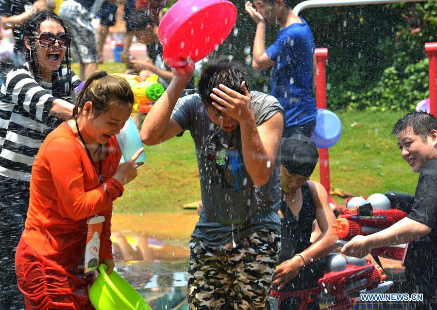 Water-sprinkling festival celebrated in SW China's Yunnan