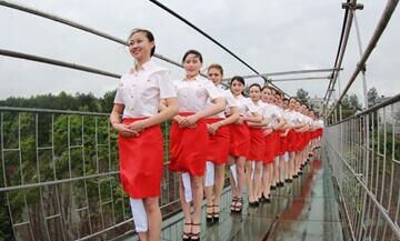 Etiquette training on all-glass suspension bridge
