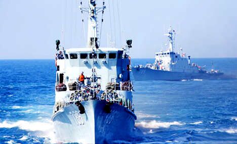 PLA Navy's South China Sea Fleet conduct realistic training