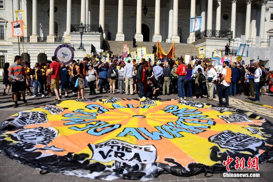 Thousands of protesters rally outside Capitol Hill against big money in politics