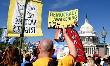 Thousands of protesters rally outside Capitol Hill against big money in politics