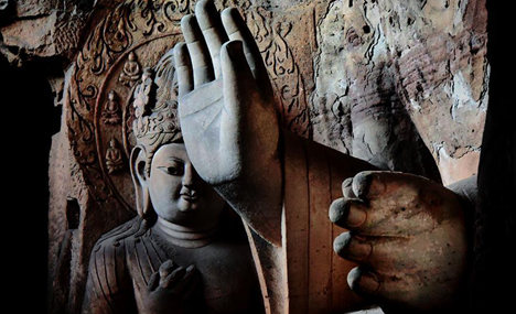 Buddha statues at grottoes across China