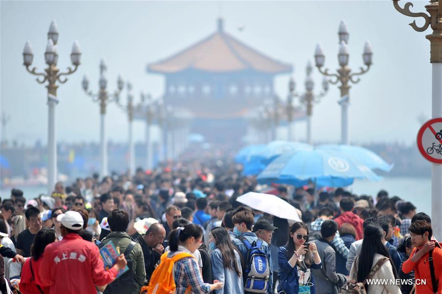 China targets tourist misbehavior