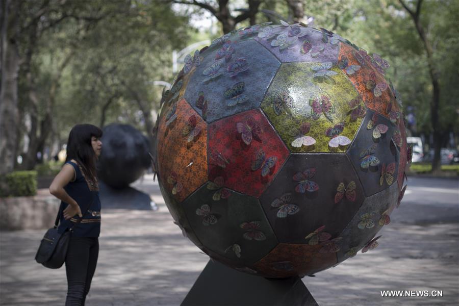 64 sculptures in shape of soccer ball exhibited in Mexico