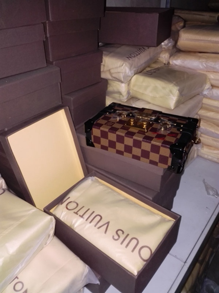 Alibaba, Louis Vuitton crack down fake LV products - People's