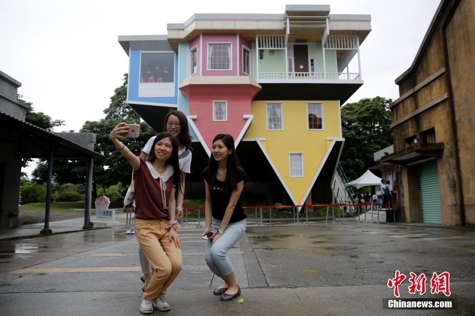 Upside down house attracts visitors in Taipei