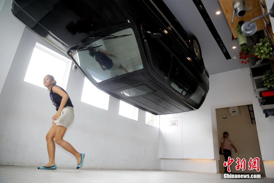 Upside down house attracts visitors in Taipei
