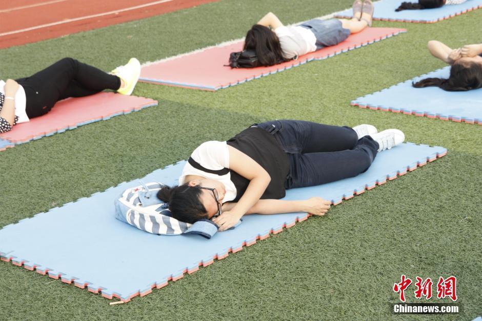 College students sleep on playground calling attention to sleep quality