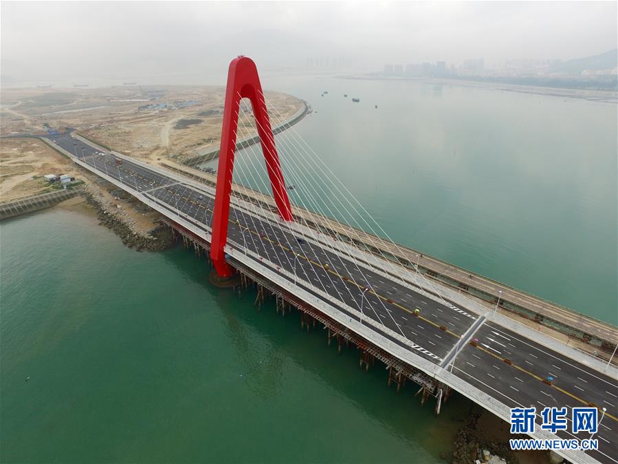 Bridge Connects China's First Artificial Offshore Island with Mainland