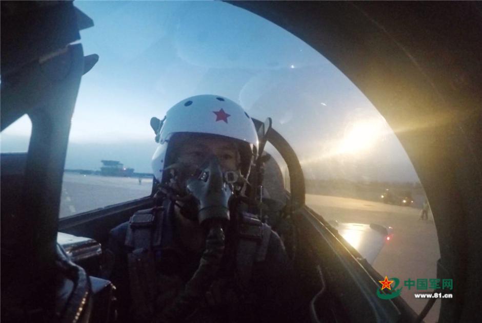 Fighters conduct drill over the Qilian Mountains