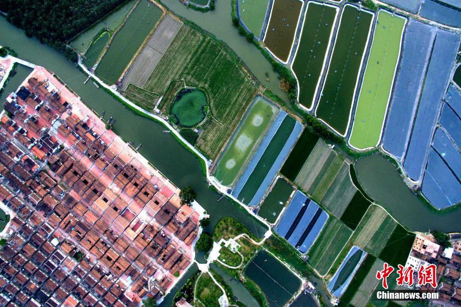 Aerial view of ancient village on water in SE China