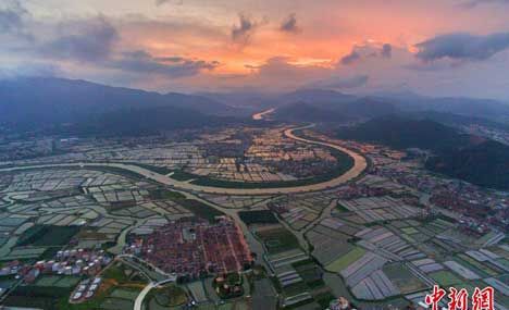 Aerial view of ancient village on water in SE China