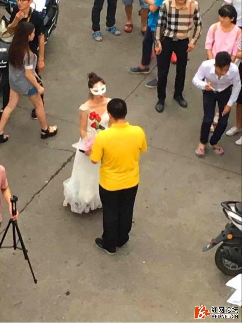 Female college teacher proposes to student in wedding dress