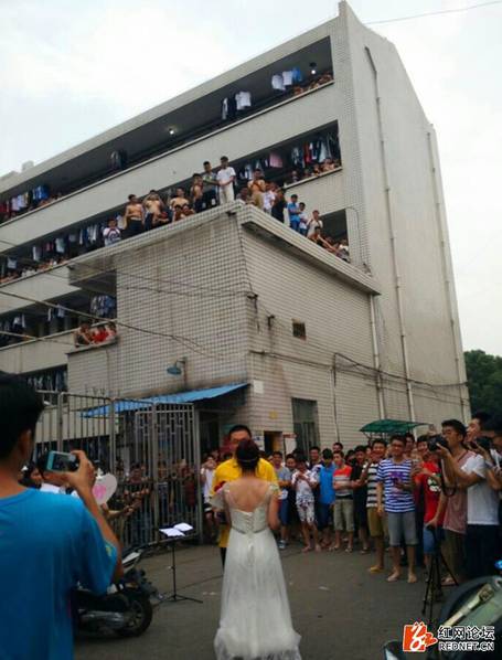 Female college teacher proposes to student in wedding dress