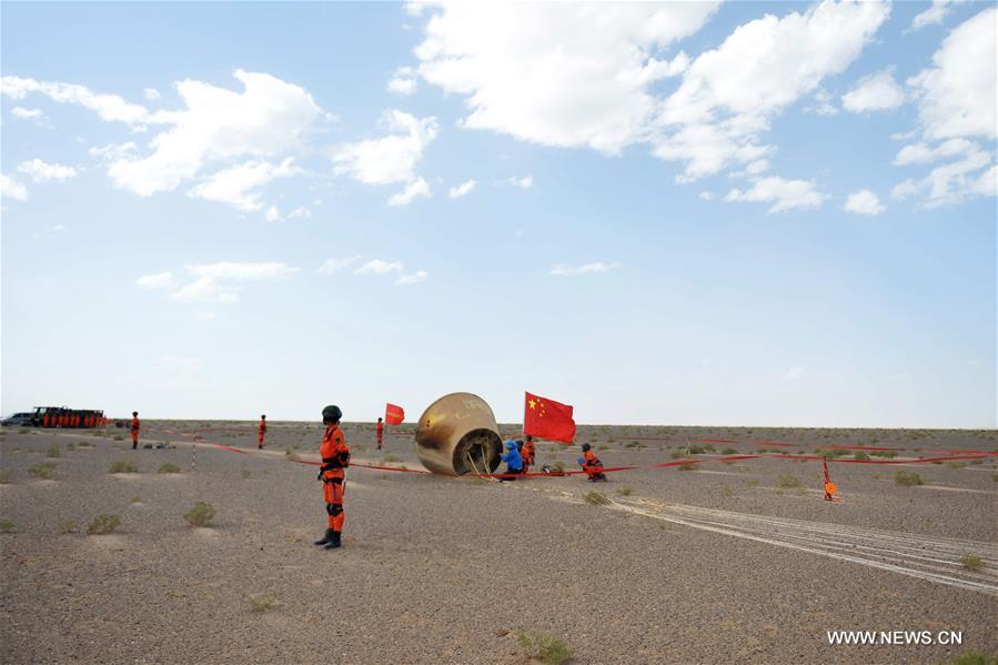 Reentry module aboard Long March-7 lands successfully