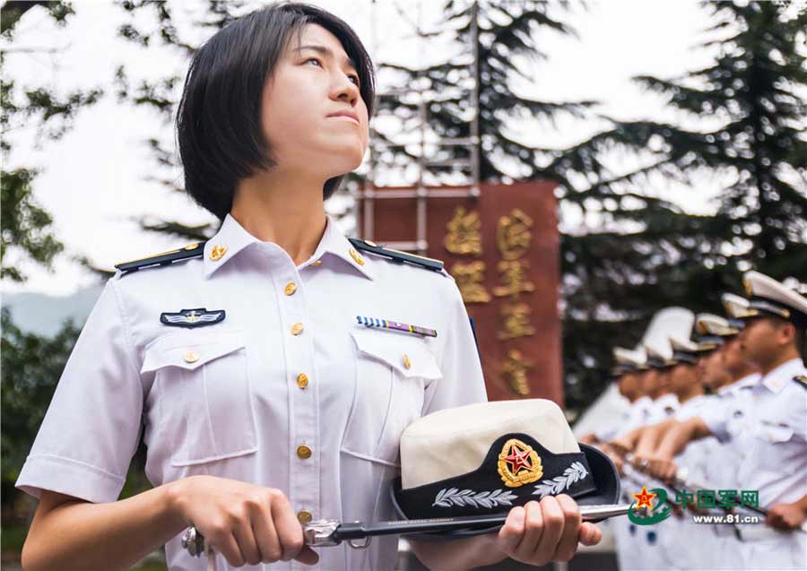 Swords conferred upon naval academy graduates