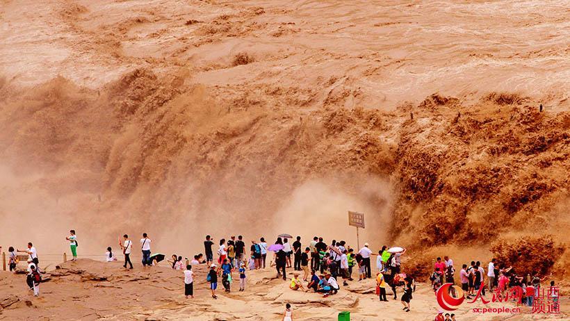 Heavy rains add to beauty of Hukou Waterfall