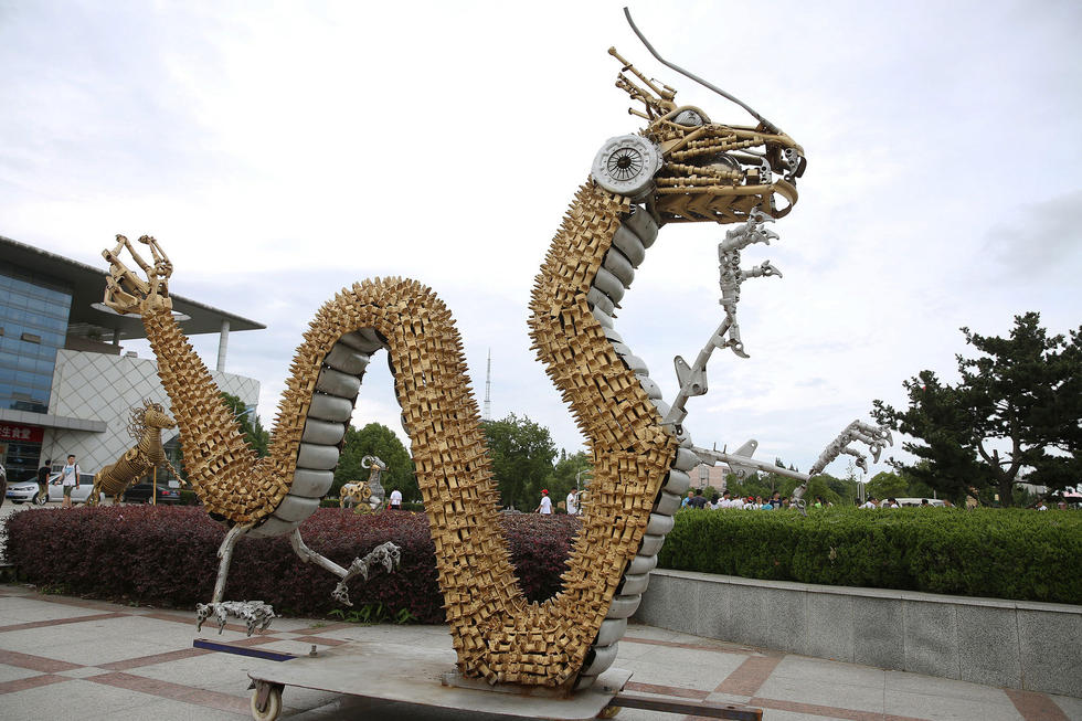 Chinese zodiac made of recycled automotive parts on display in Anhui