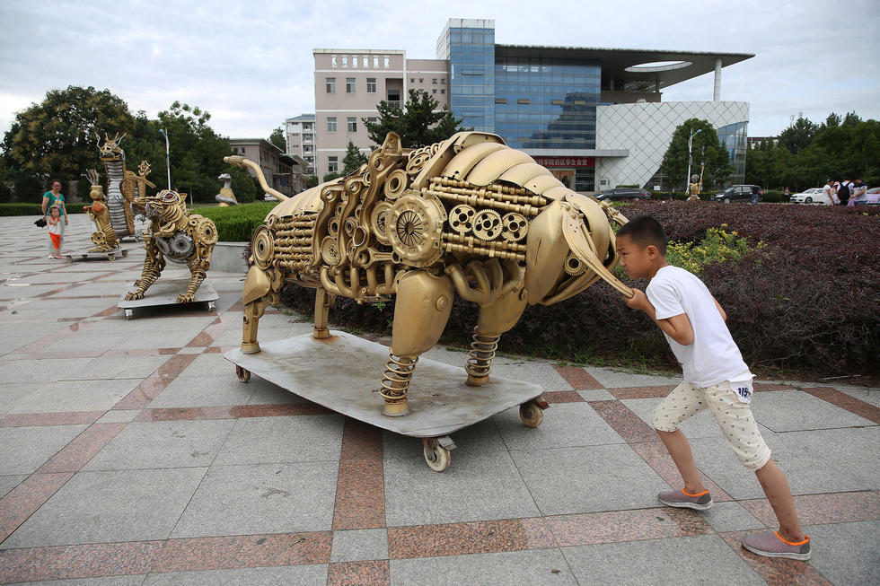 Chinese zodiac made of recycled automotive parts on display in Anhui