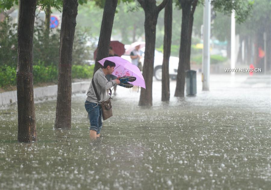 One dead, 34 missing in rain, as Hebei on red rainstorm alert
