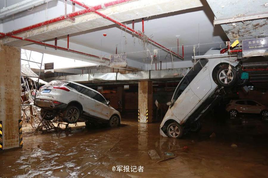 Rising from the ashes: soldier creates beautiful mural from Nepartak mud