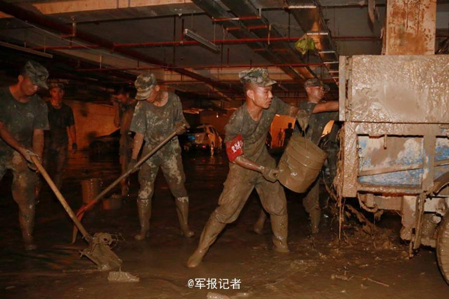 Rising from the ashes: soldier creates beautiful mural from Nepartak mud