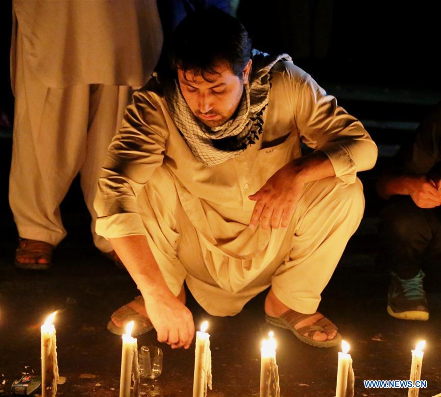 People commemorate victims of suicide attack in Kabul, Afghanistan