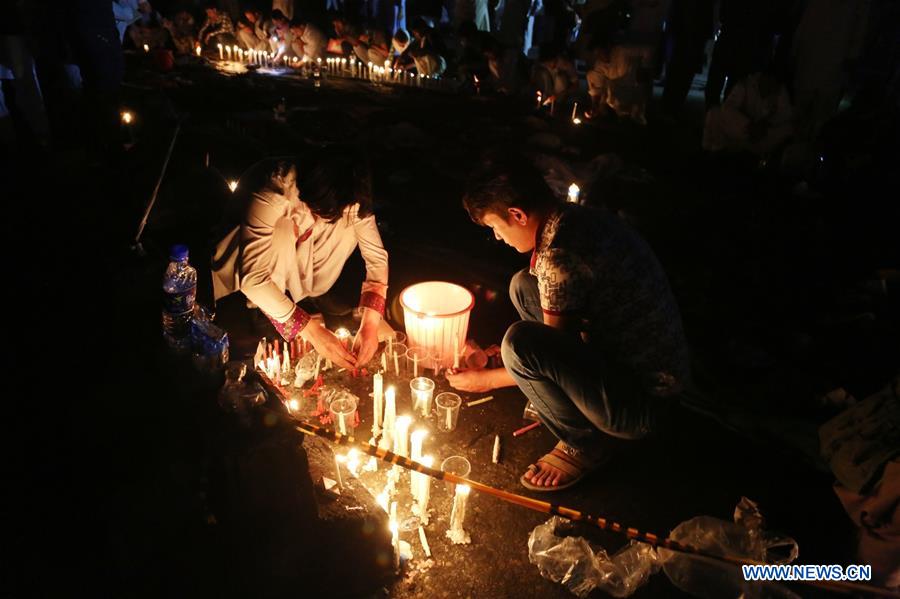 People commemorate victims of suicide attack in Kabul, Afghanistan