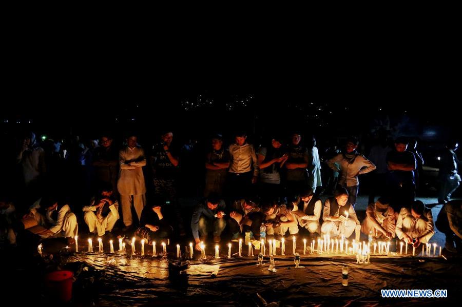 People commemorate victims of suicide attack in Kabul, Afghanistan