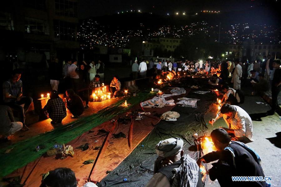 People commemorate victims of suicide attack in Kabul, Afghanistan